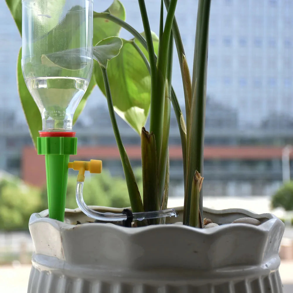 Drip Irrigation Automatic Plant Flowerpot Waterers System Adjustable Drip Water Spikes Taper Plants Pot Watering Coke Bottles